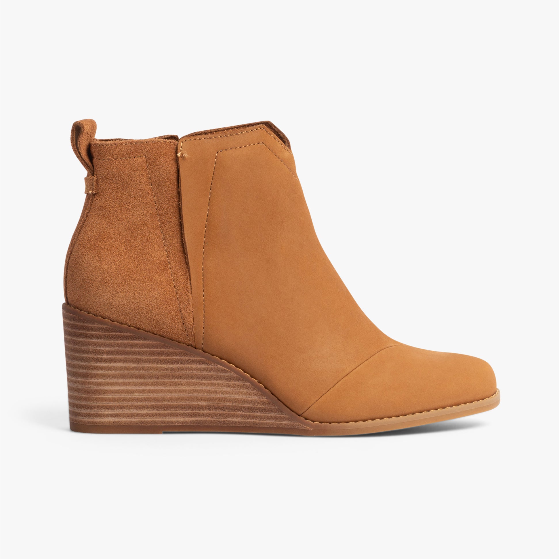 TOMS CLARE Womens Boots Tan side view featuring wedge heel and suede details, ankle height design in tan color.