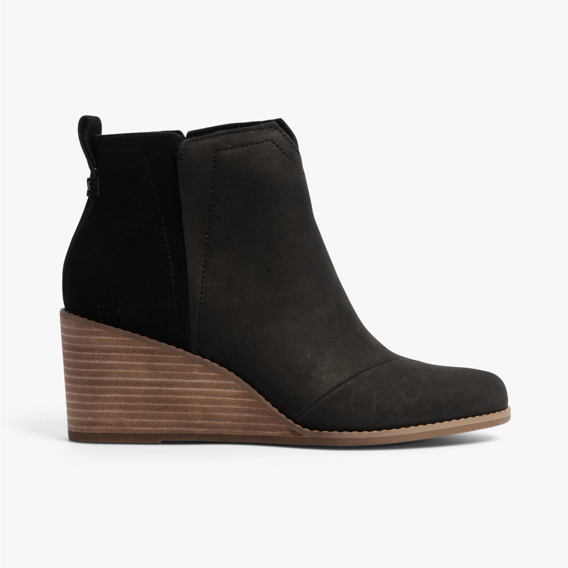 TOMS CLARE Womens Boots Black side view featuring leather/suede upper, wedge heel, ankle height for stylish comfort.