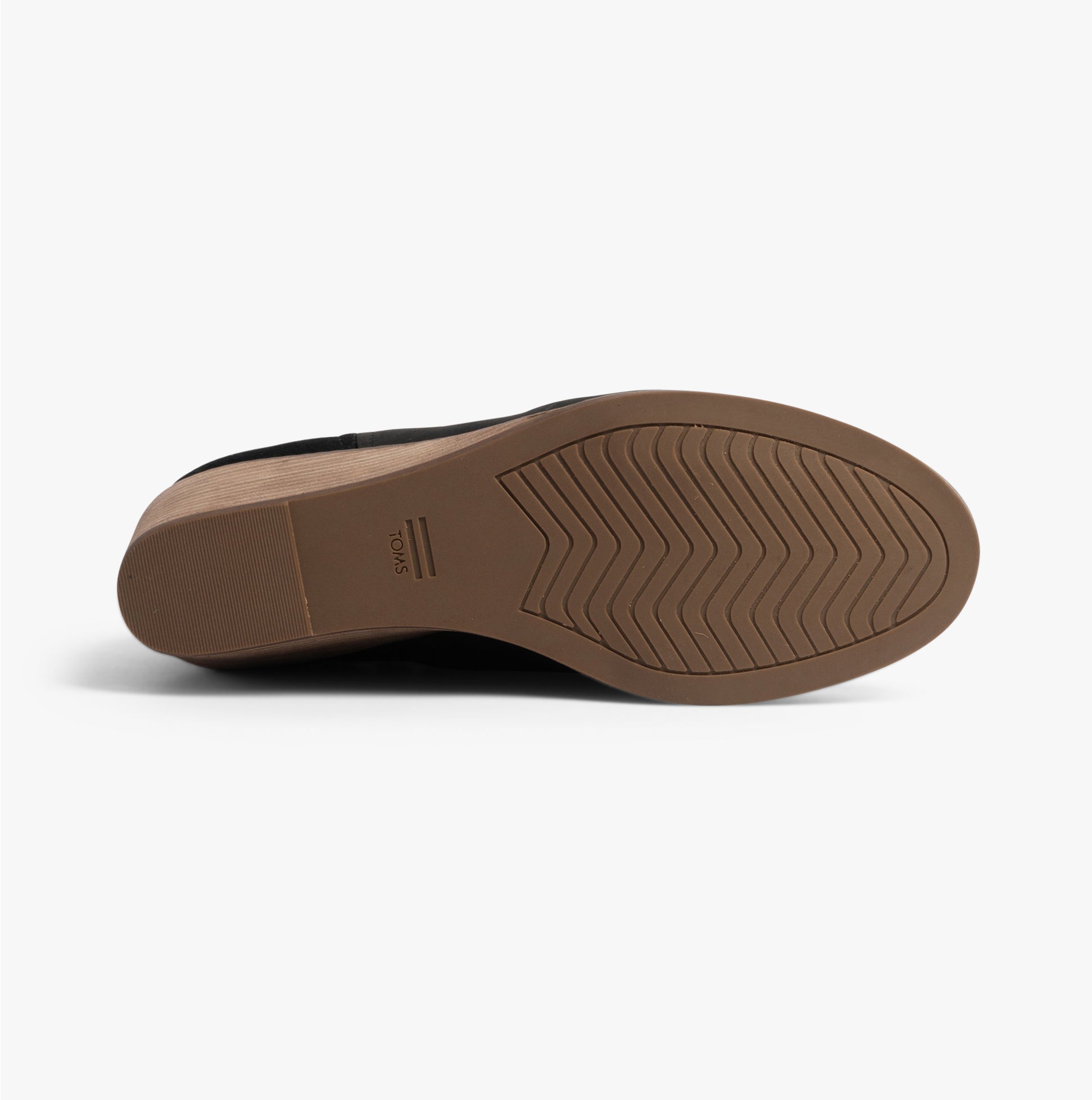 TOMS CLARE Womens Boots Black sole view highlighting rubber material and wedge heel design.