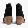 TOMS CLARE Womens Boots Black back view showing wedge heel and pull-on design.