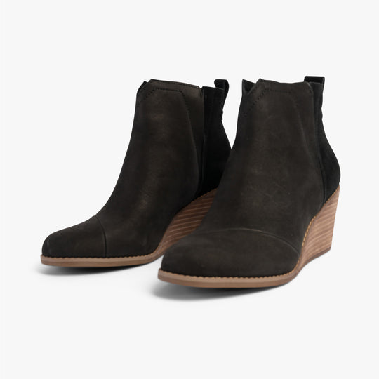 TOMS CLARE Womens Boots Black side view showing leather and suede upper with wedge heel.