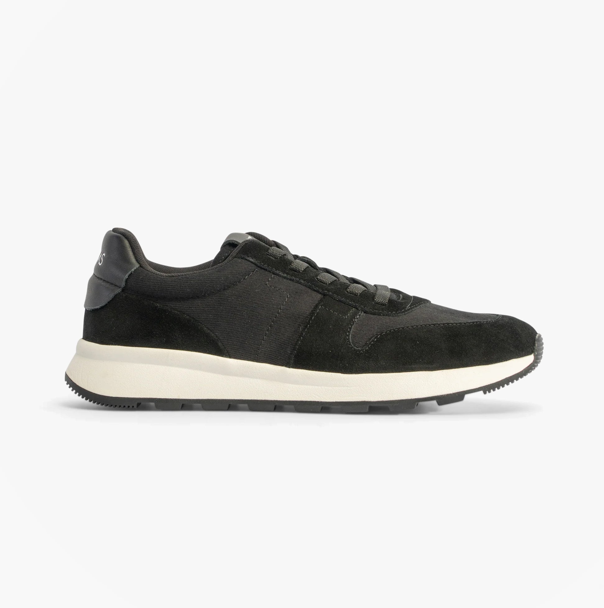 TOMS TRVL LITE RETRO Mens Trainers Black side view featuring suede upper and rubber sole.