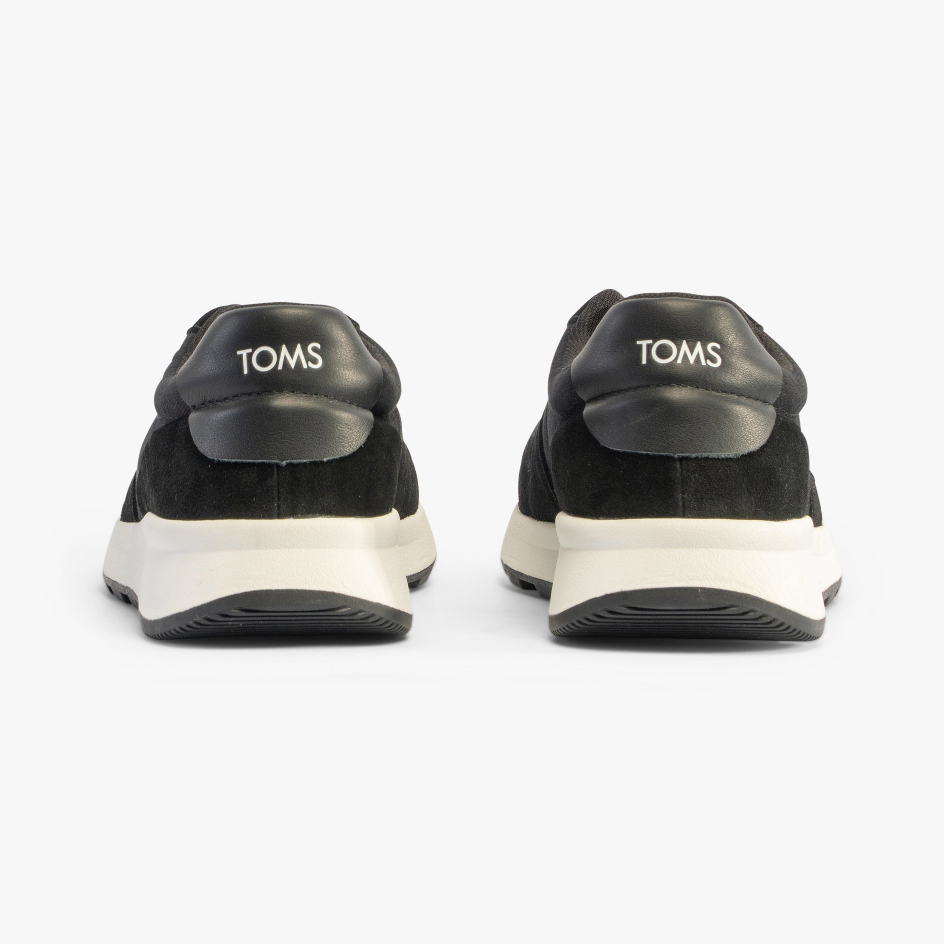 TOMS TRVL LITE RETRO Mens Trainers Black back view with suede upper and rubber sole.