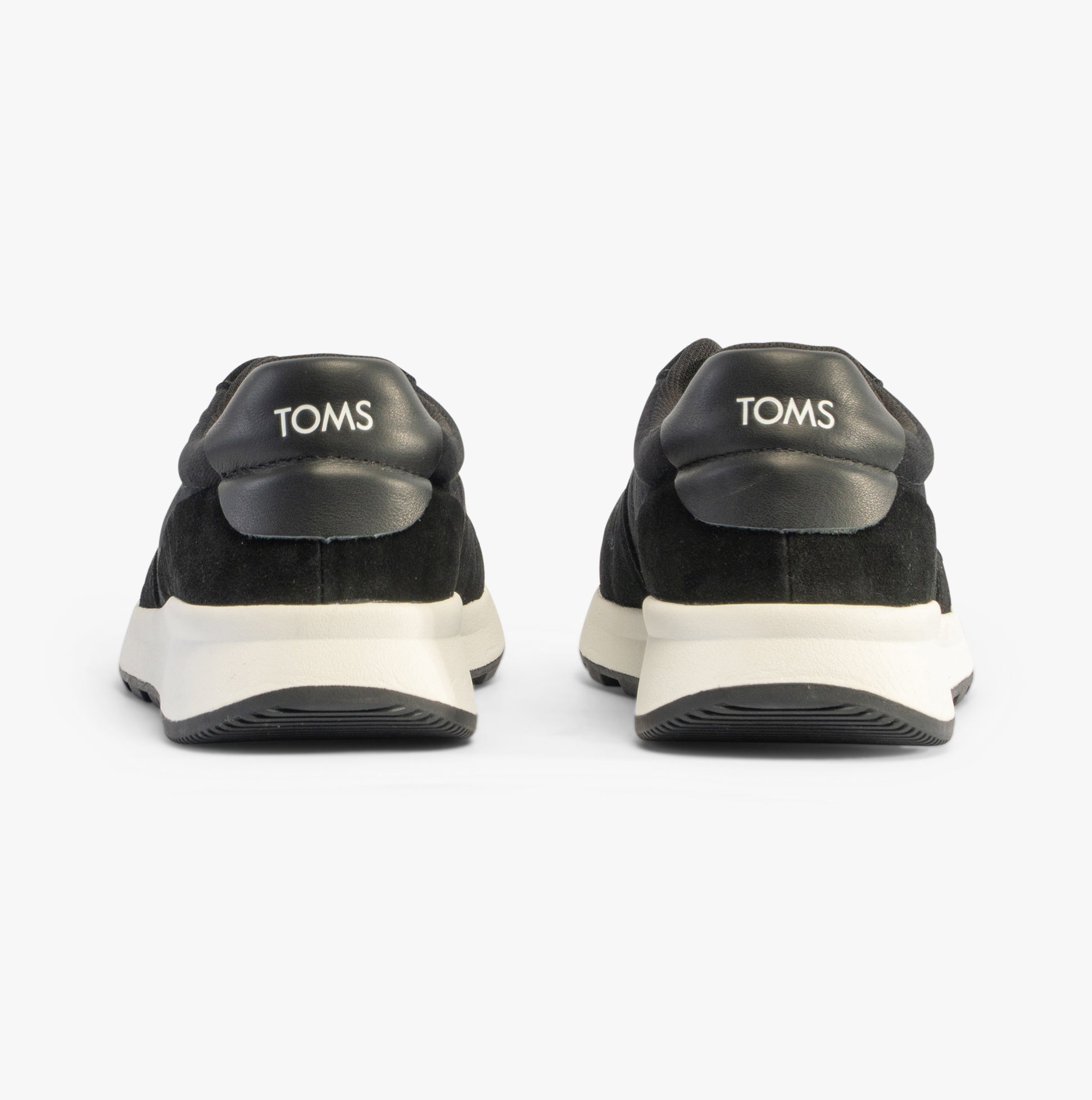 TOMS TRVL LITE RETRO Mens Trainers Black back view with suede upper and rubber sole.