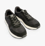 TOMS TRVL LITE RETRO Mens Trainers Black top view showing lace-up design and suede upper.