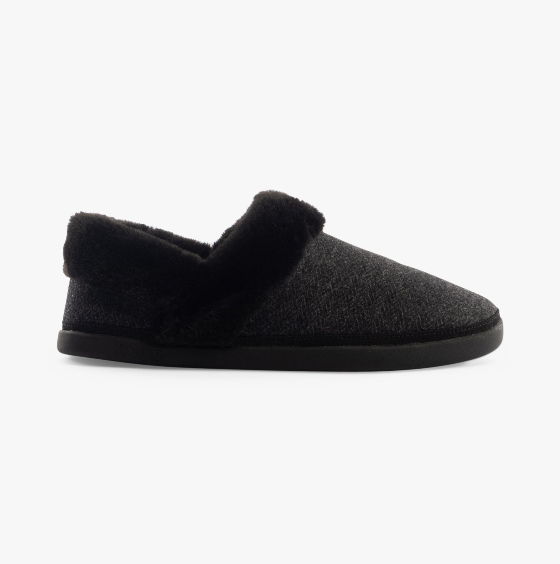 TOMS OSLO Womens Slippers Black side view featuring soft textile upper and relaxed fit.