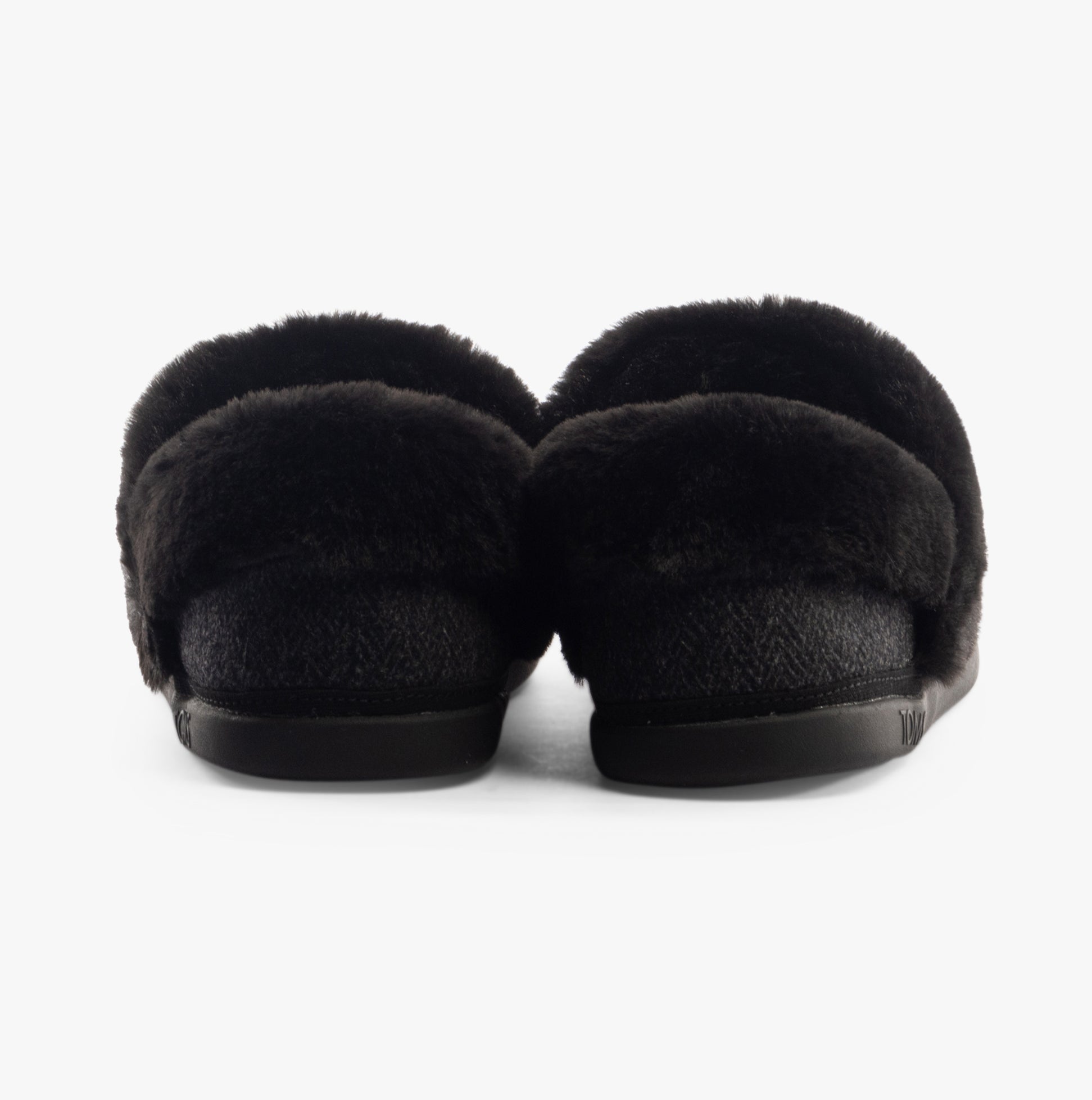 TOMS OSLO Womens Slippers Black back view showing soft textile lining and flat rubber sole.