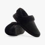 TOMS OSLO Womens Slippers Black side view showing the soft textile upper and round toe design.