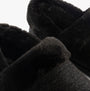 TOMS OSLO Womens Slippers Black detail view showcasing soft textile lining and round toe shape.