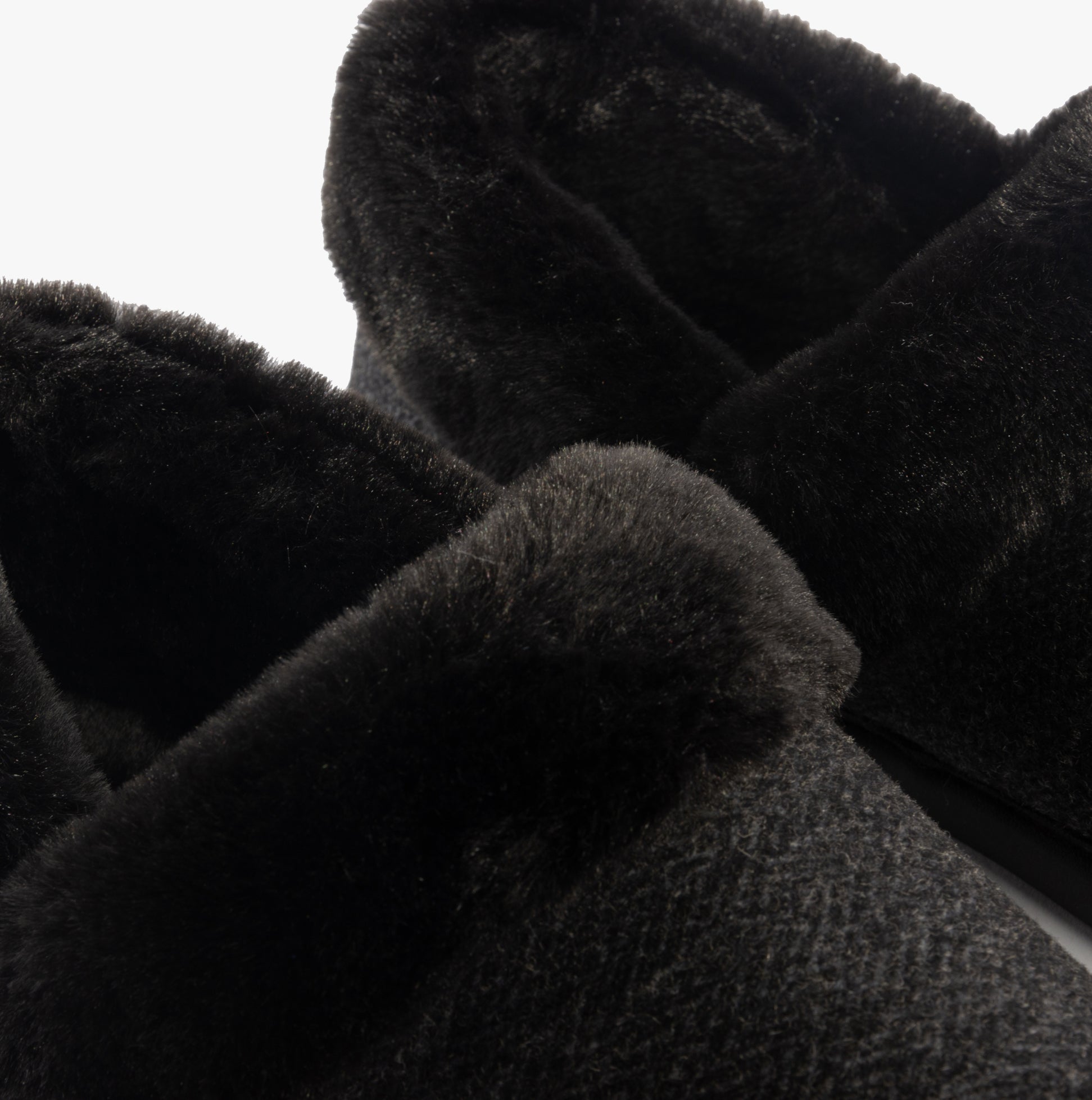 TOMS OSLO Womens Slippers Black detail view showcasing soft textile lining and round toe shape.