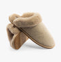 TOMS VALERIE Womens Slippers Natural side view with plush lining and rubber sole.