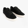 TOMS TRVL LITE RIO Mens Trainers Black side view showcasing lace-up design and relaxed fit.
