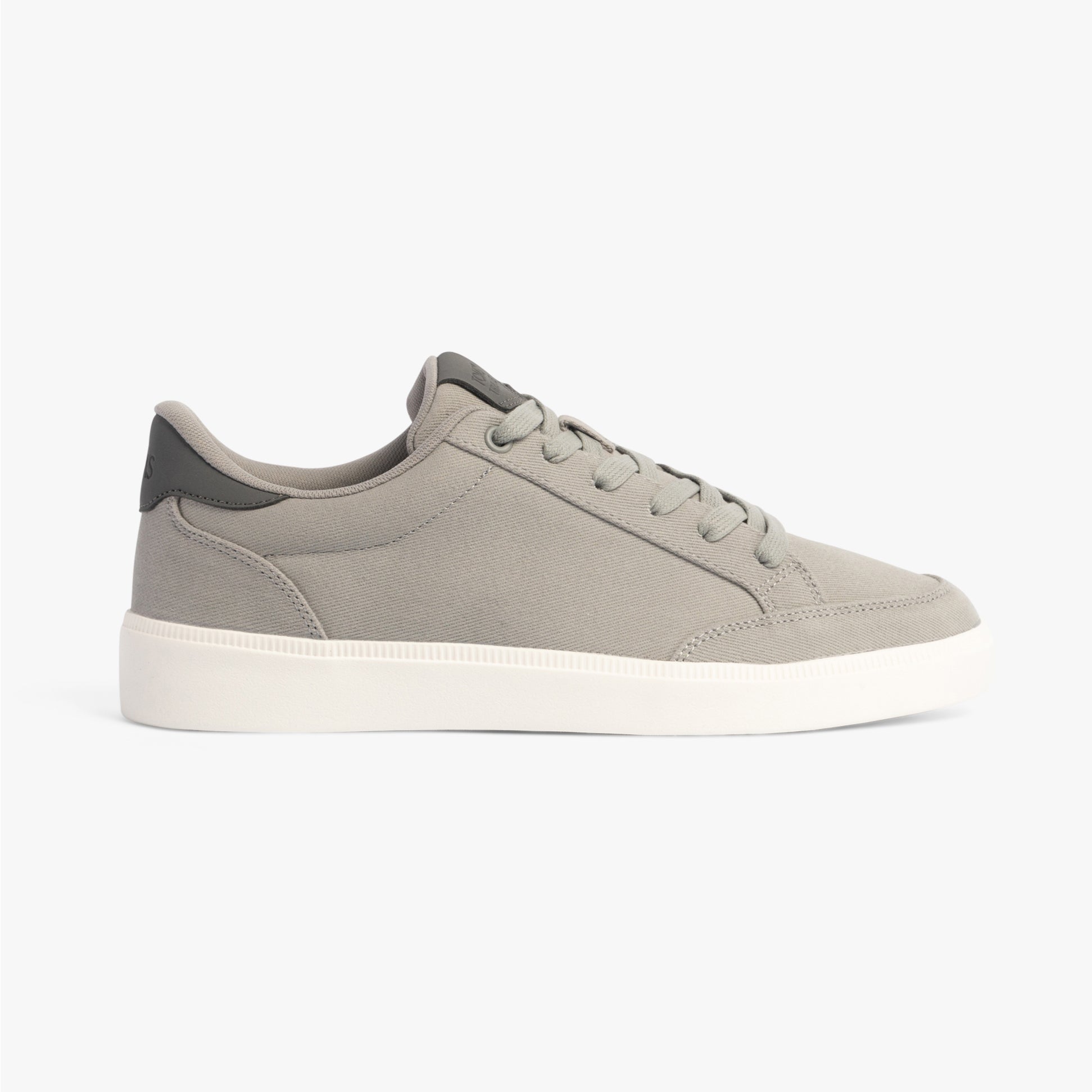 TOMS TRVL LITE RIO Mens Trainers Grey side view showcasing textile upper and rubber sole.