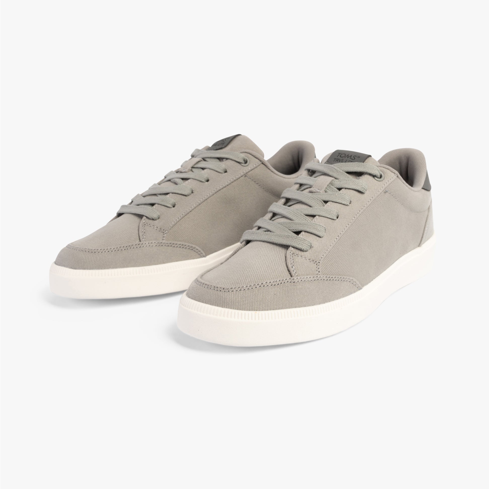TOMS TRVL LITE RIO Mens Trainers Grey side view showing lightweight textile upper and lace-up closure.