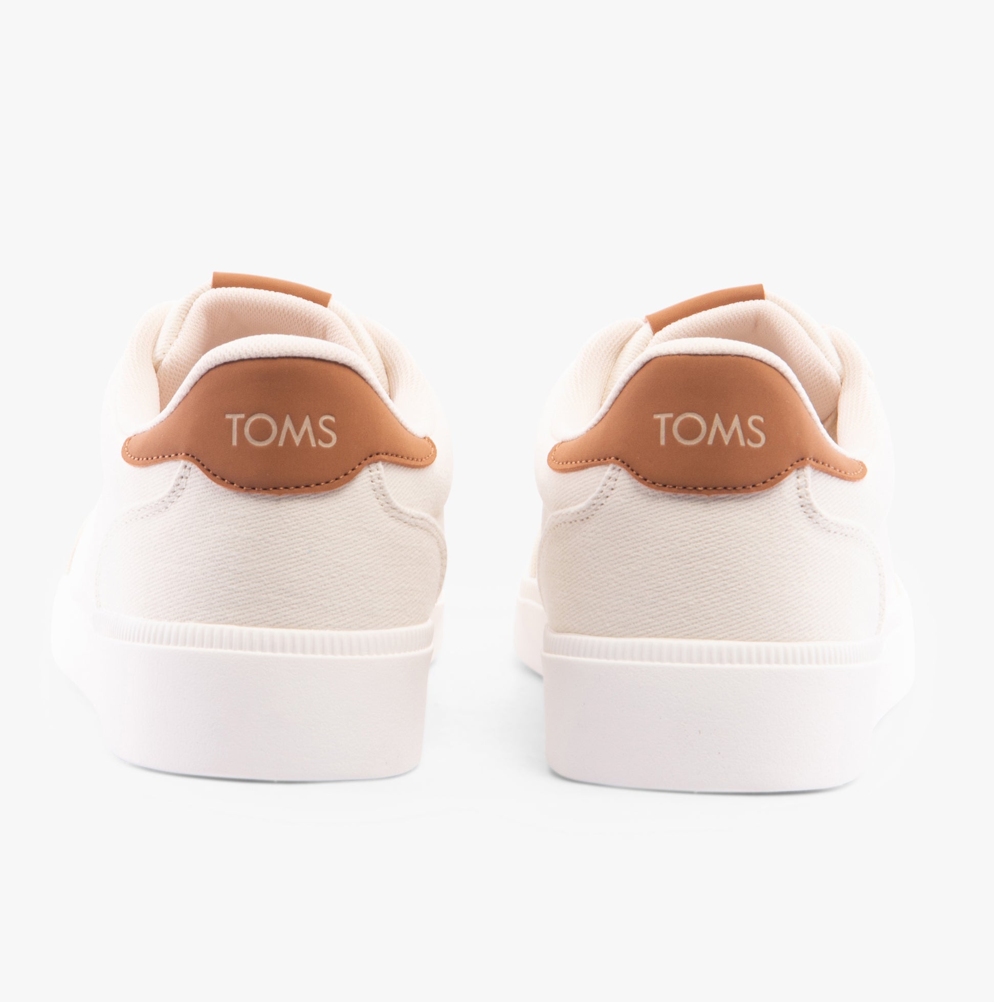 TOMS TRVL LITE RIO Mens Trainers Beige rear view showing textile upper and logo detail.