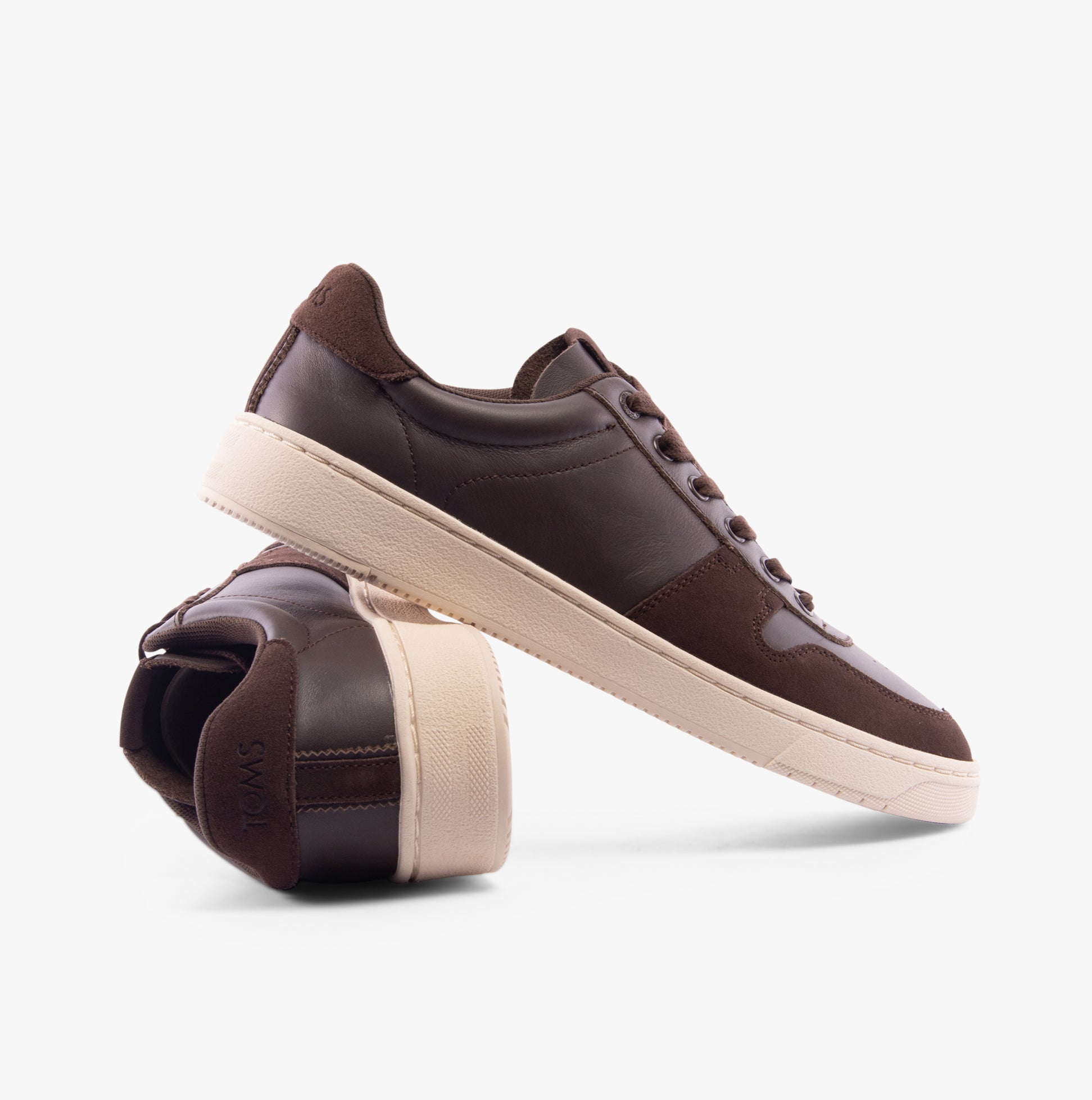 TOMS TRVL LITE COURT Mens Trainers Brown side view showcasing leather and suede materials with lace-up closure.