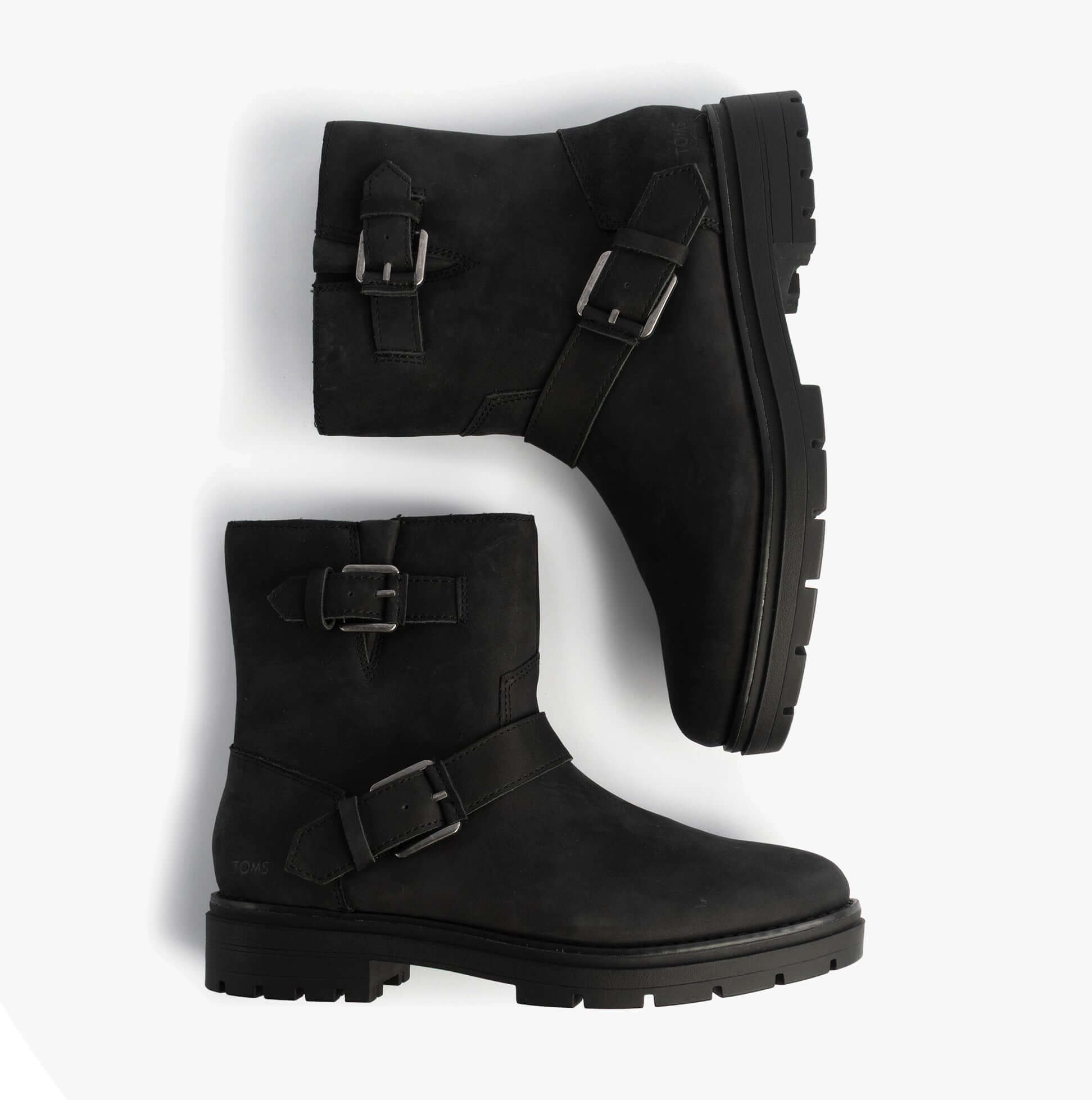 TOMS IONIE MOTO Womens Ankle Boots Black side view with buckles and rubber sole.