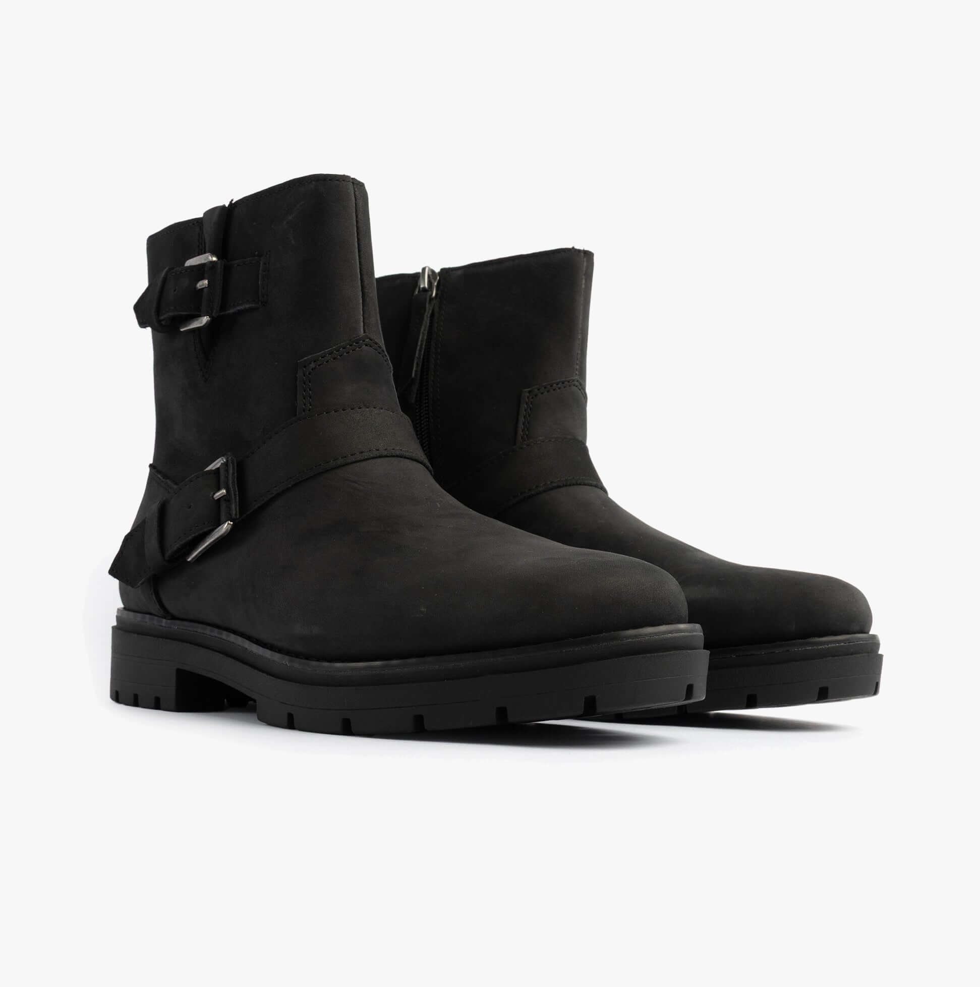 TOMS IONIE MOTO Womens Ankle Boots Black side view showcasing leather upper, round toe, and zip closure.