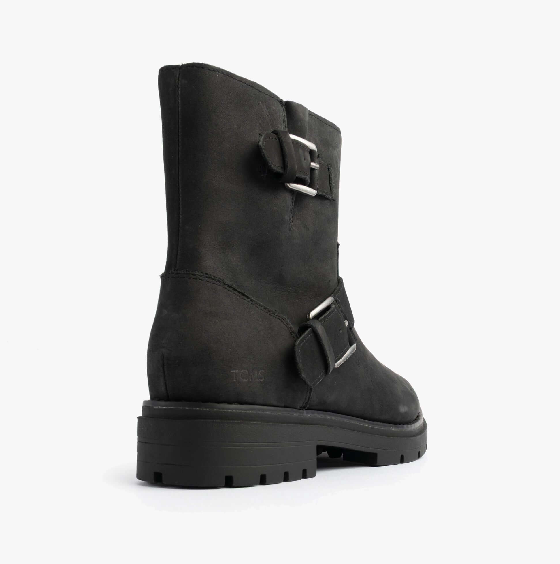 TOMS IONIE MOTO Womens Ankle Boots Black side view showcasing leather material and buckle details.