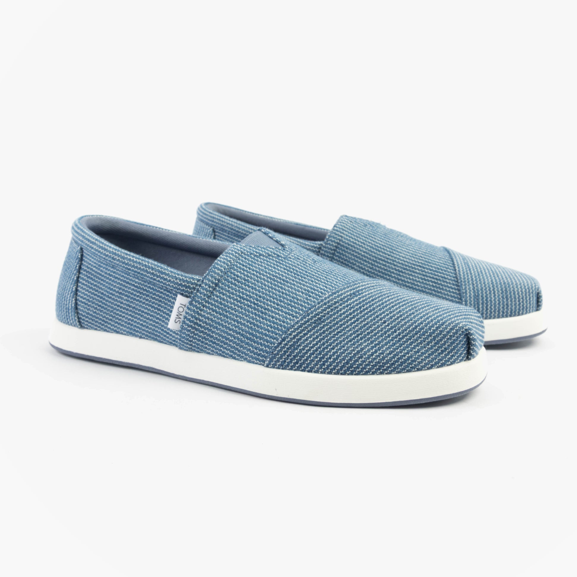 TOMS ALP FWD Mens Espadrille Blue side view showing textile upper and slip-on design with a relaxed fit.
