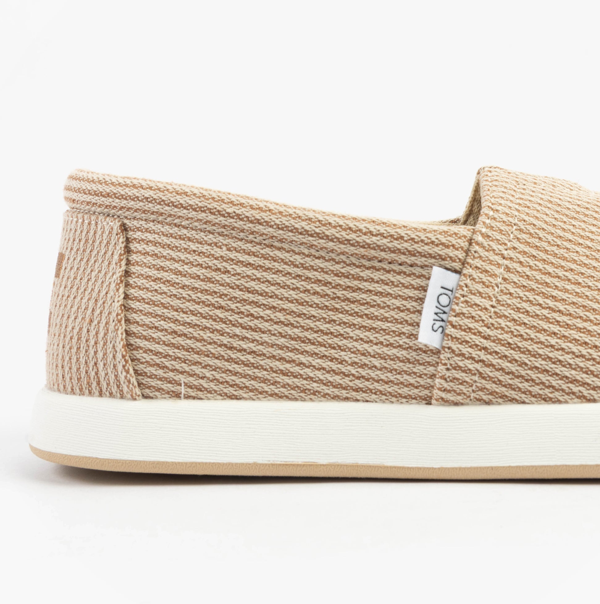 TOMS ALP FWD Mens Espadrille Beige side view showcasing textile upper and relaxed fit.