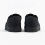 TOMS CARLO 2.0 Mens Trainers Black rear view showing canvas upper and rubber sole.