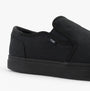 Side view of TOMS BAJA 2.0 Mens Casual Canvas Trainers Black showcasing canvas upper and slip-on design.