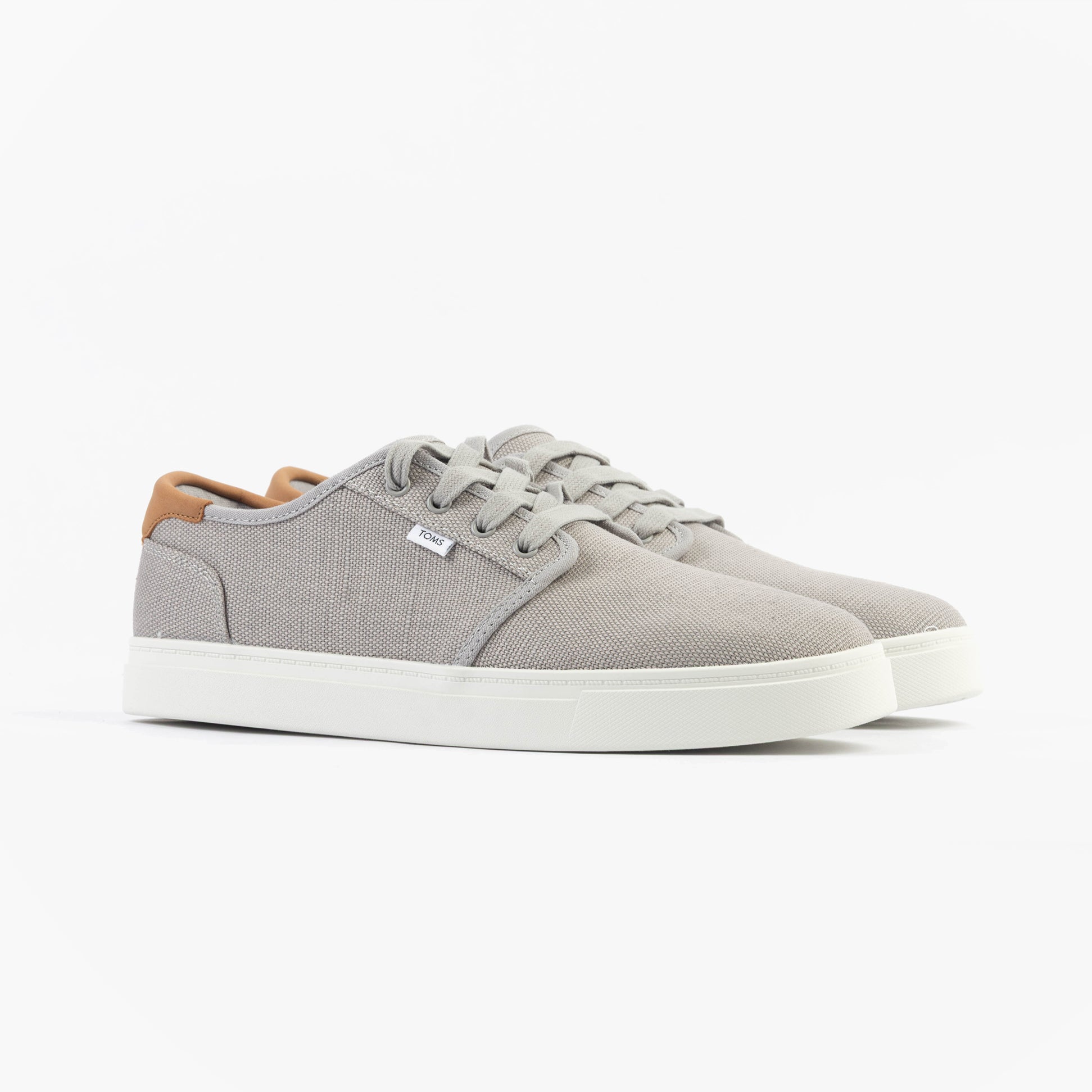 TOMS CARLO 2.0 Mens Trainers Grey side view showing canvas upper and rubber sole.