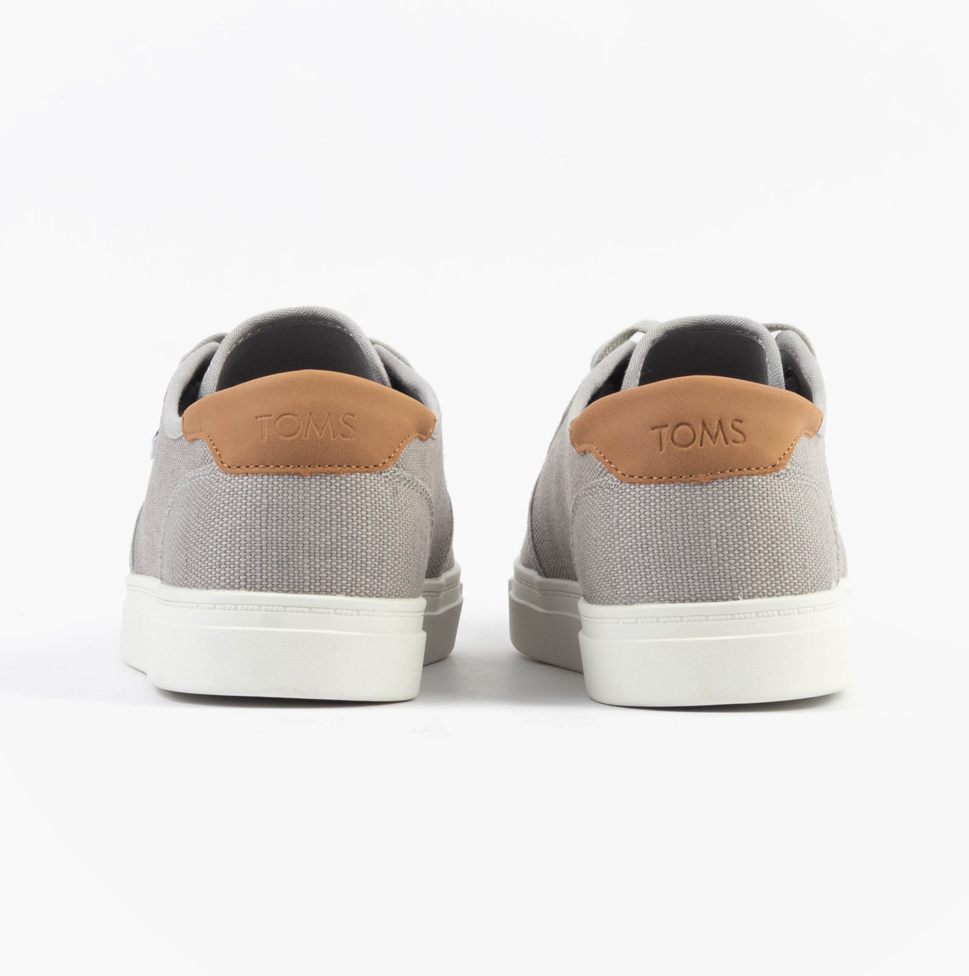 TOMS CARLO 2.0 Mens Trainers Grey back view showing grey canvas and tan heel details.