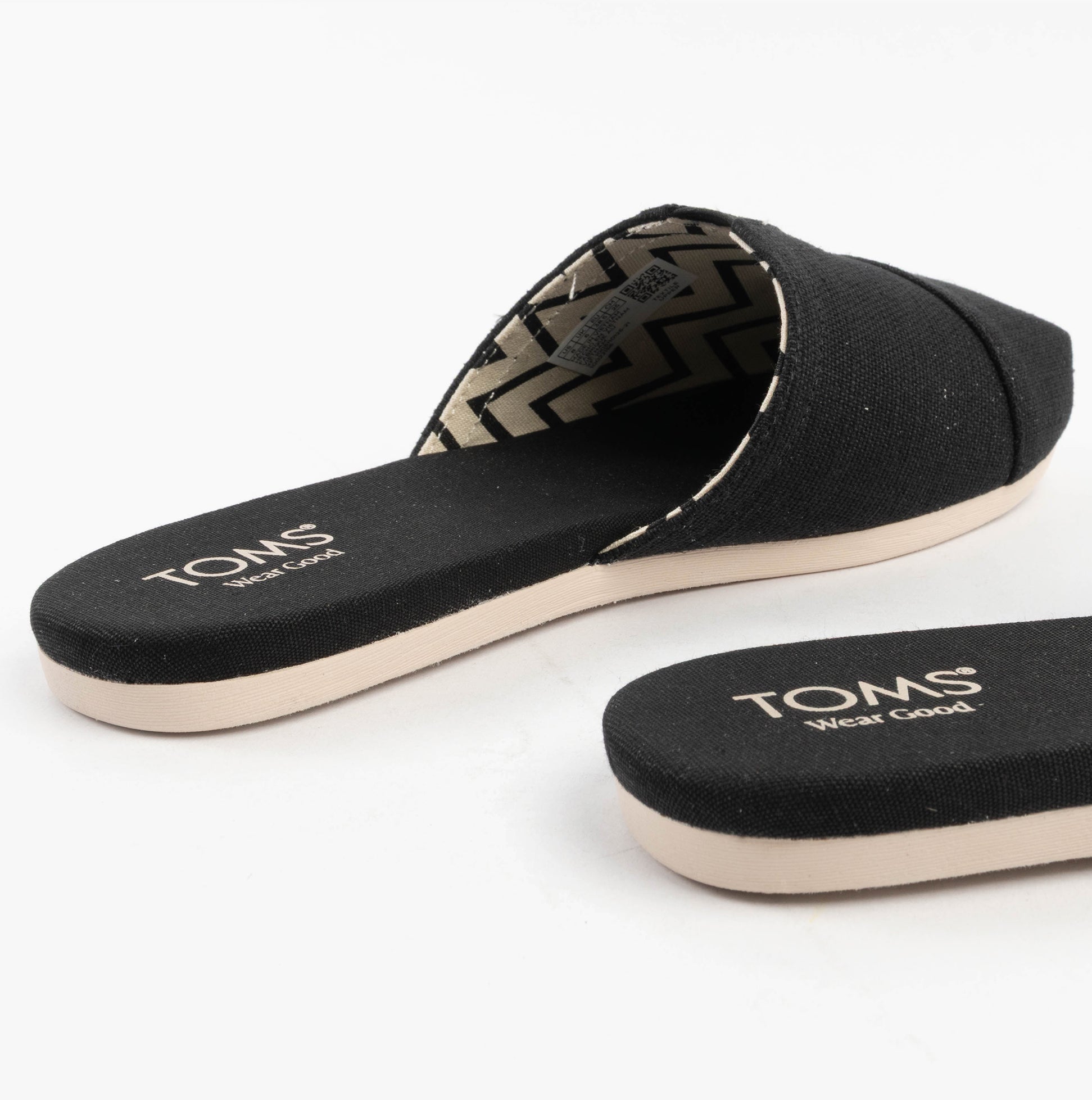 TOMS ALPARGATA MULE Womens Espadrille Black side view showing textile upper and slip-on design.