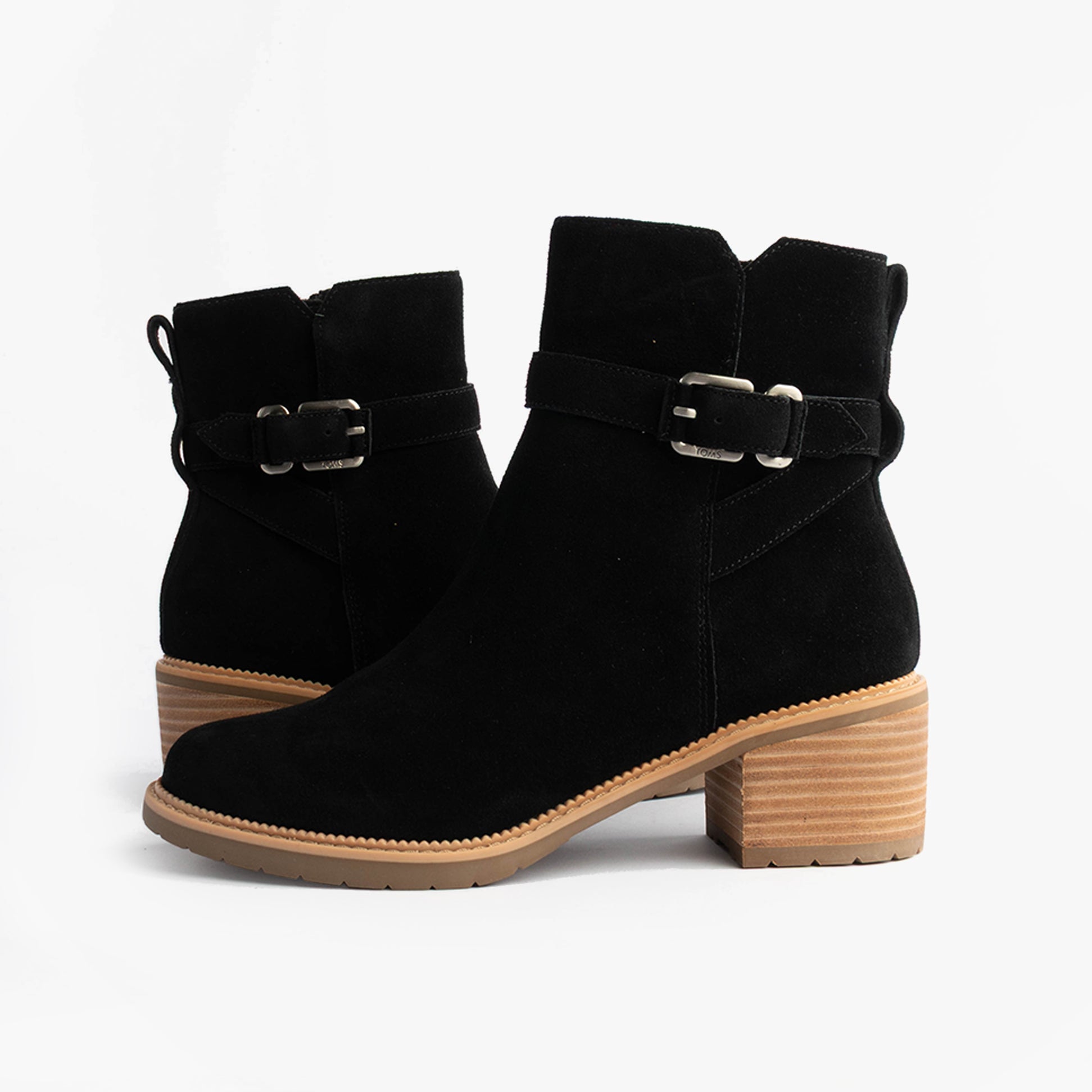 TOMS HAILEY BUCKLE Womens Ankle Boots Black side view showcasing buckle detail and rubber sole.