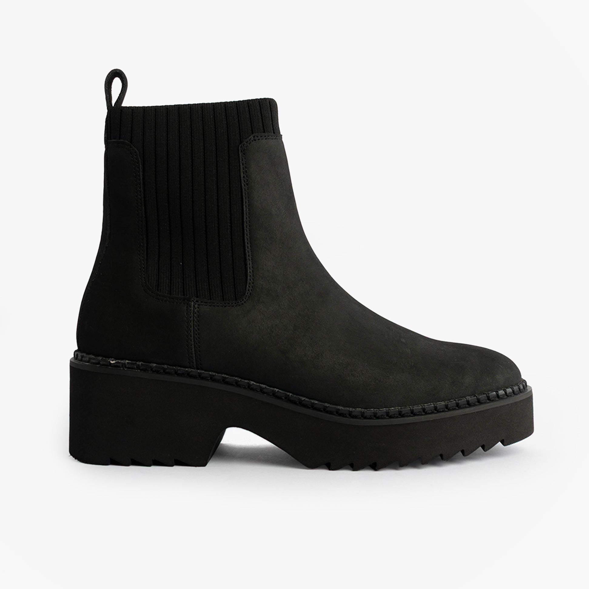 TOMS MILLIE Womens Ankle Boots Black side view featuring leather upper, rubber sole, and round toe shape.