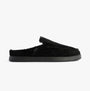 TOMS ALONSO MULE Mens Faux Shearling Lined Slippers Black side view showcasing suede upper and rubber sole.