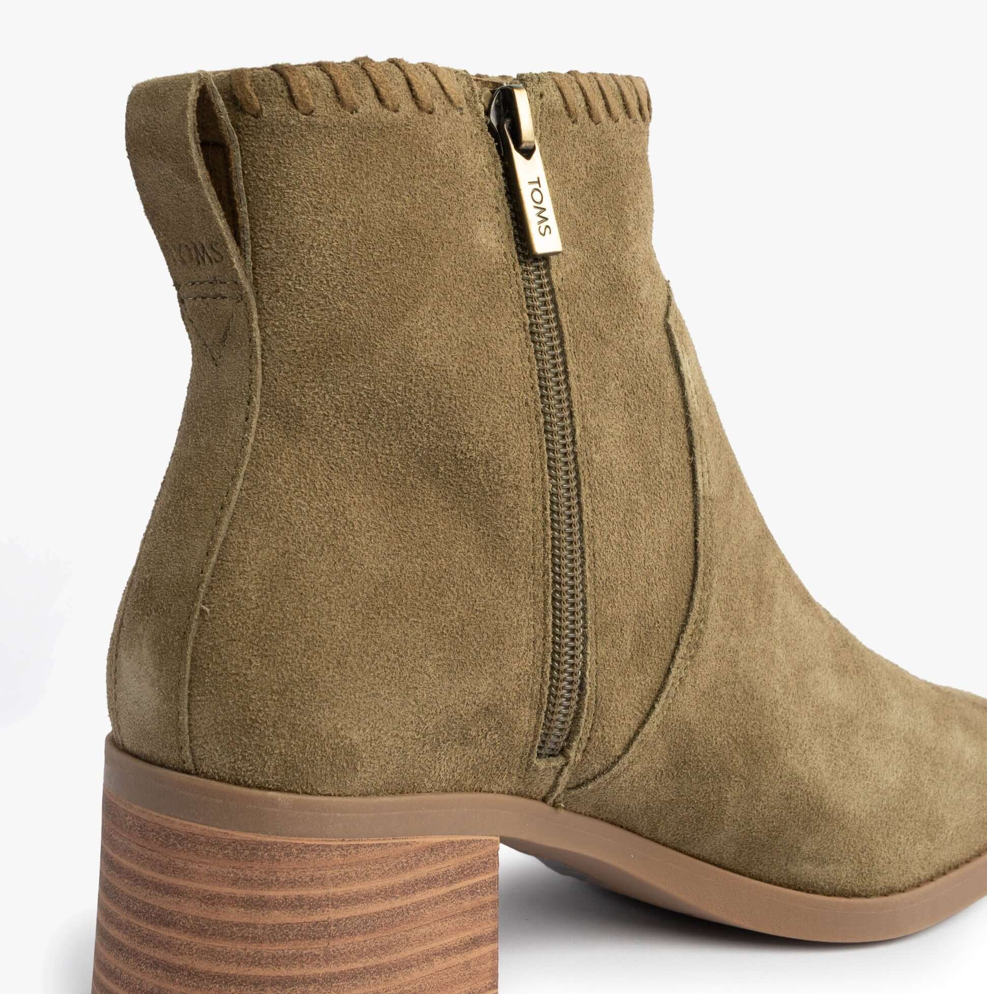 TOMS DELILAH Womens Ankle Boots Olive side view showcasing zip closure and suede texture