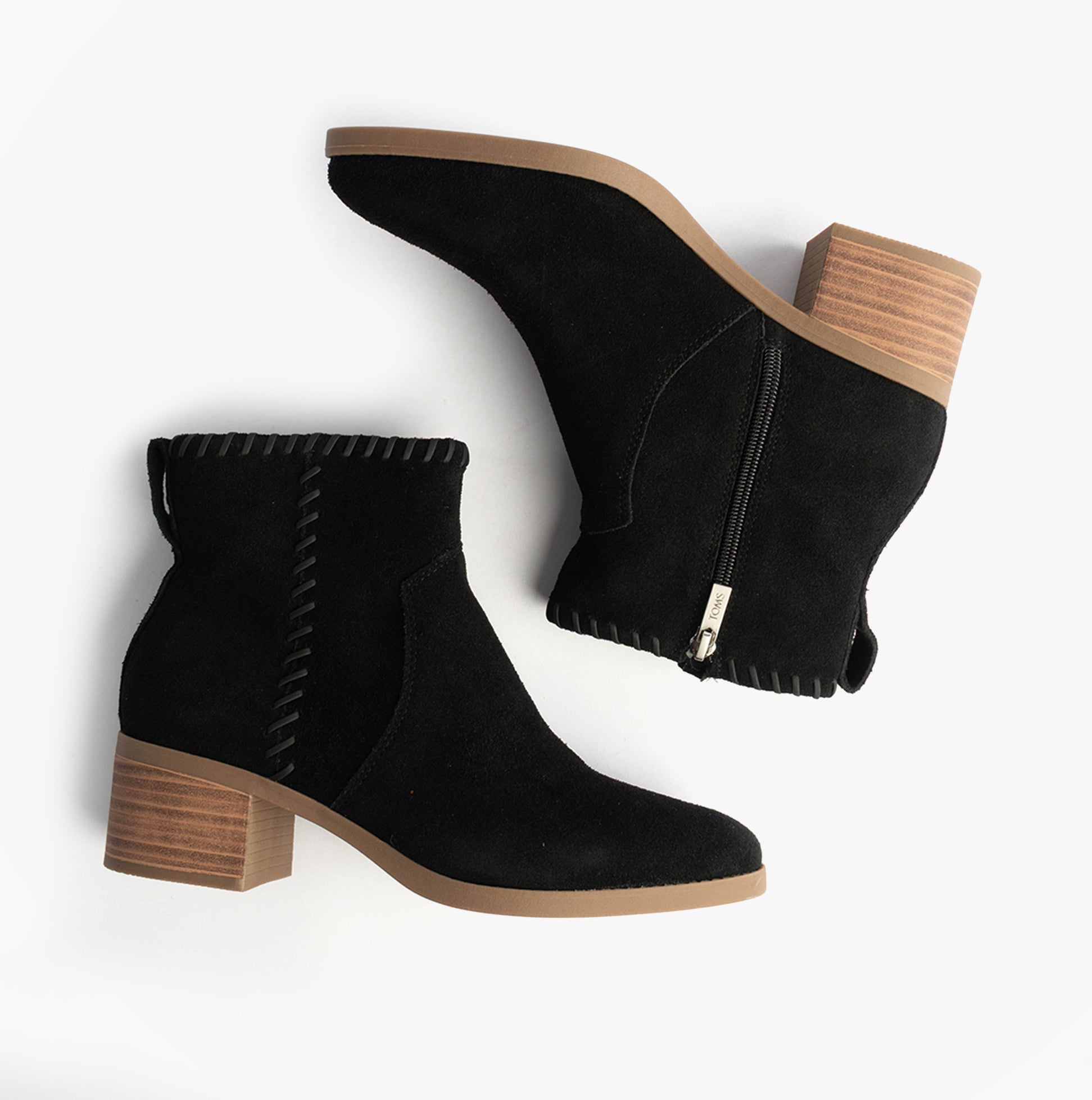 TOMS DELILAH Womens Ankle Boots Black side view and top view showcasing synthetic upper and zip closure.