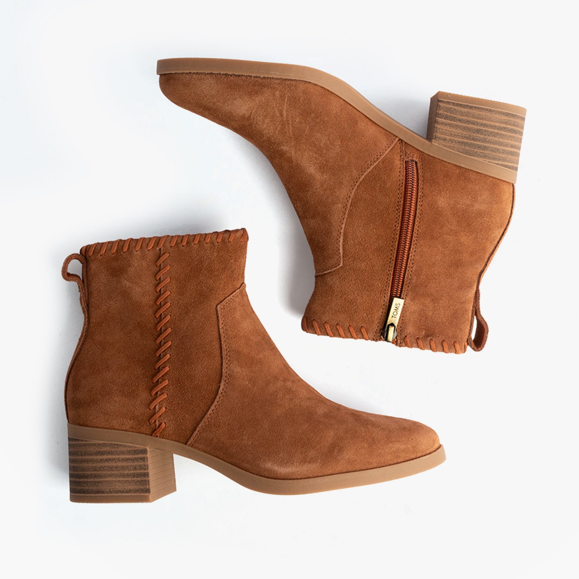 TOMS DELILAH Womens Ankle Boots Brown side view showcasing zip closure and textured upper.
