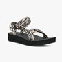 Teva MIDFORM UNIVERSAL Womens Sandals Neon Floral Black/ White side view showcasing platform heel and strap details.