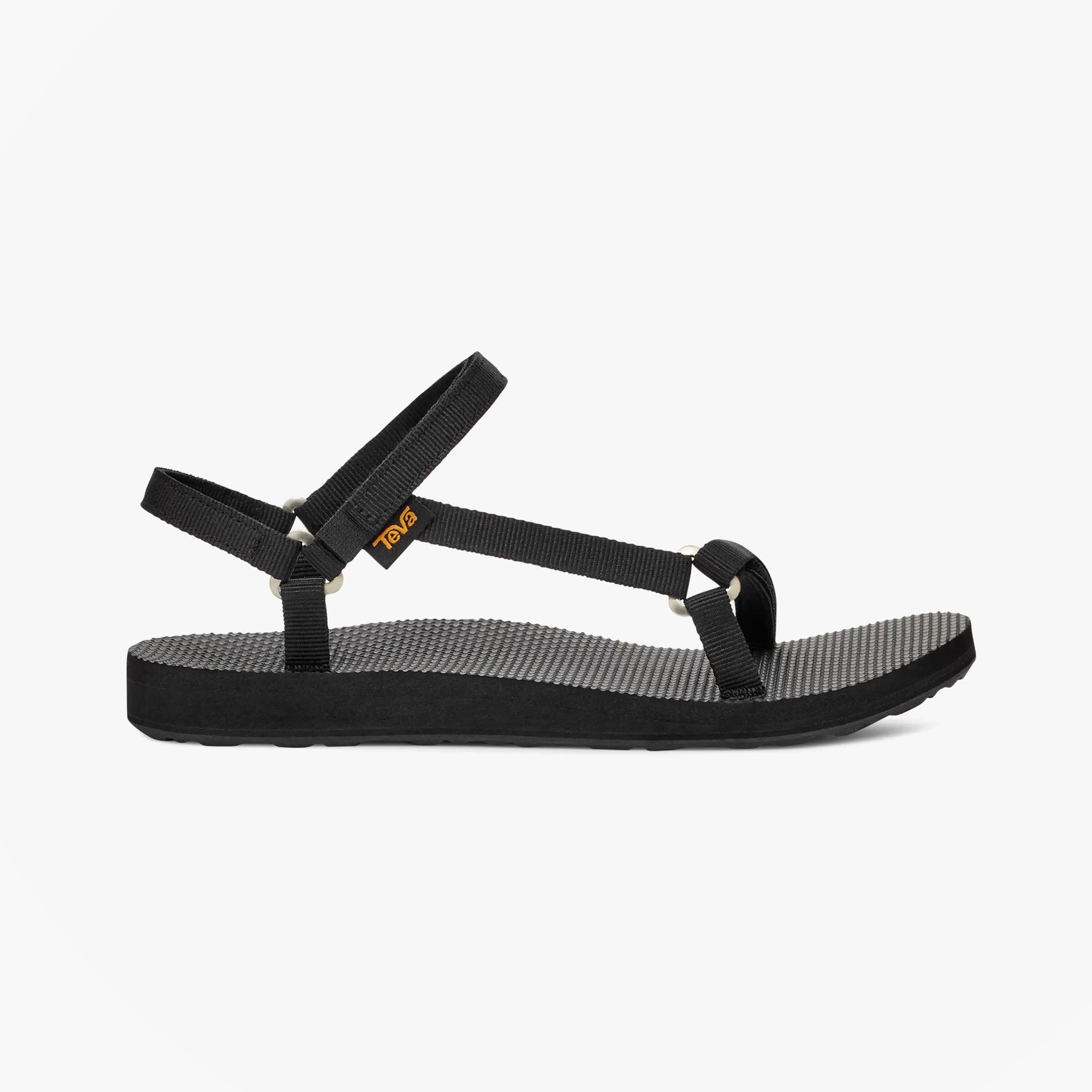 Teva ORIGINAL UNIVERSAL Womens Sandals Slim Black side view with adjustable straps and rubber sole.
