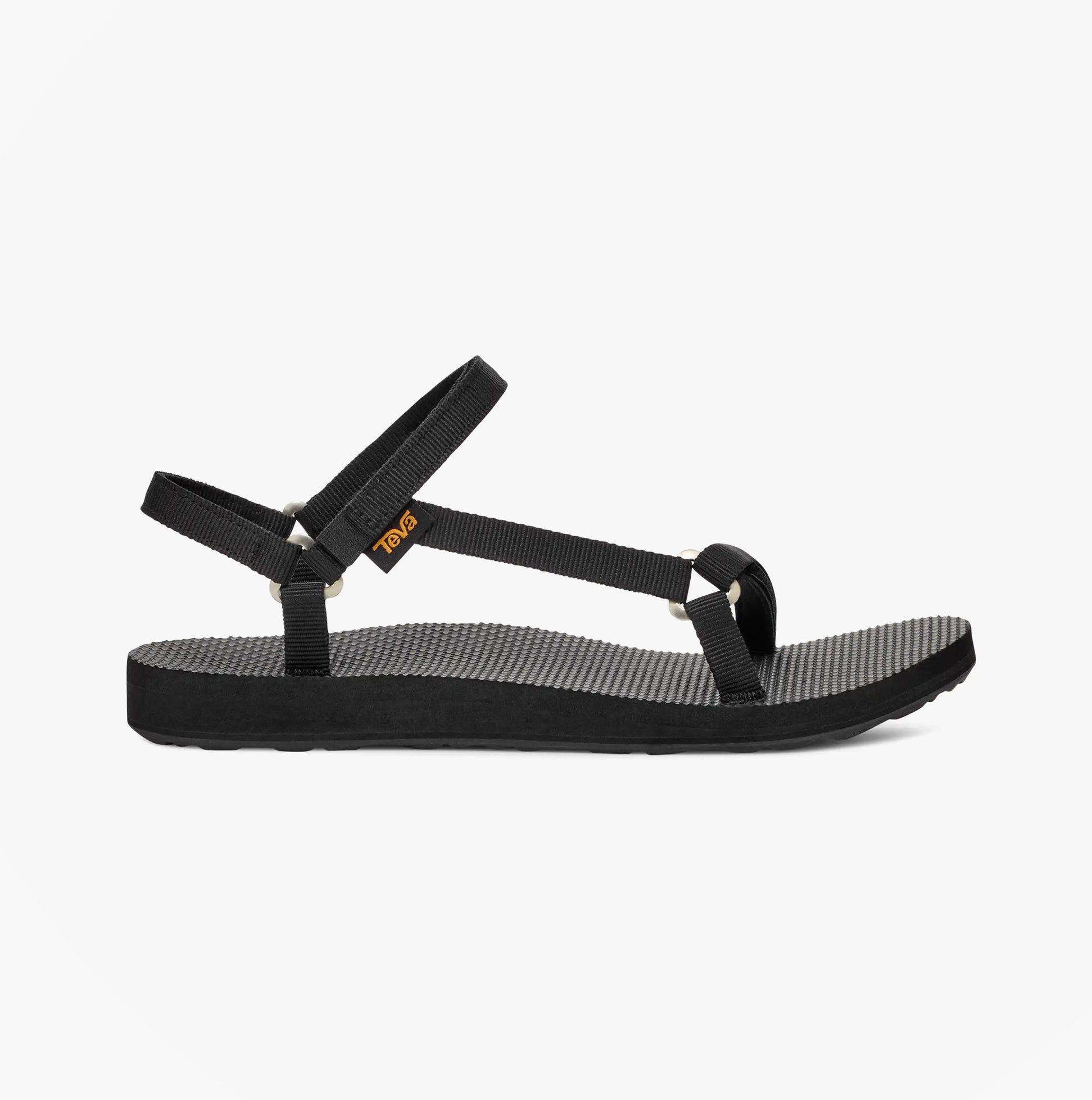 Teva ORIGINAL UNIVERSAL Womens Sandals Slim Black side view with adjustable straps and rubber sole.