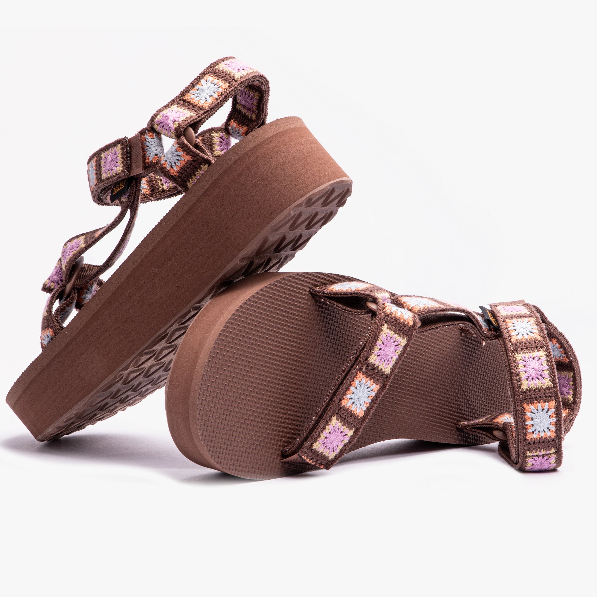 Teva FLATFORM UNIVERSAL Womens Sandals Crochet Unwind side view showcasing colorful straps and low heel.