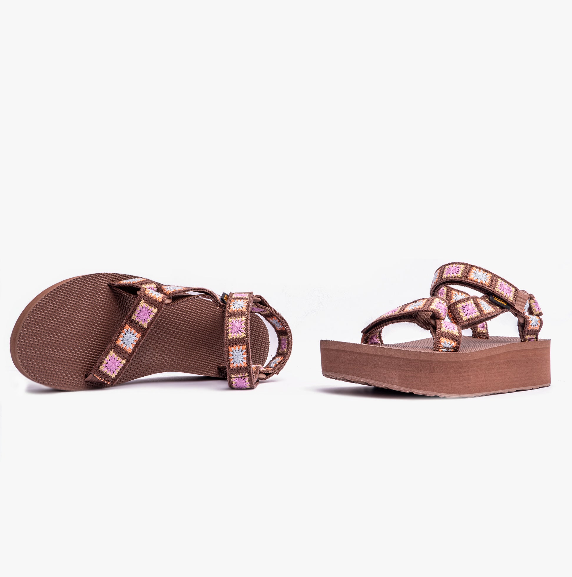 Teva FLATFORM UNIVERSAL Womens Sandals Crochet Unwind side view showcasing colorful crochet straps and low platform sole.