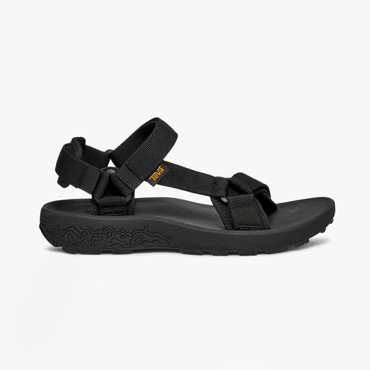 Teva HYDRATREK SANDAL Womens Sandals Black side view showcasing adjustable straps and rubber sole.