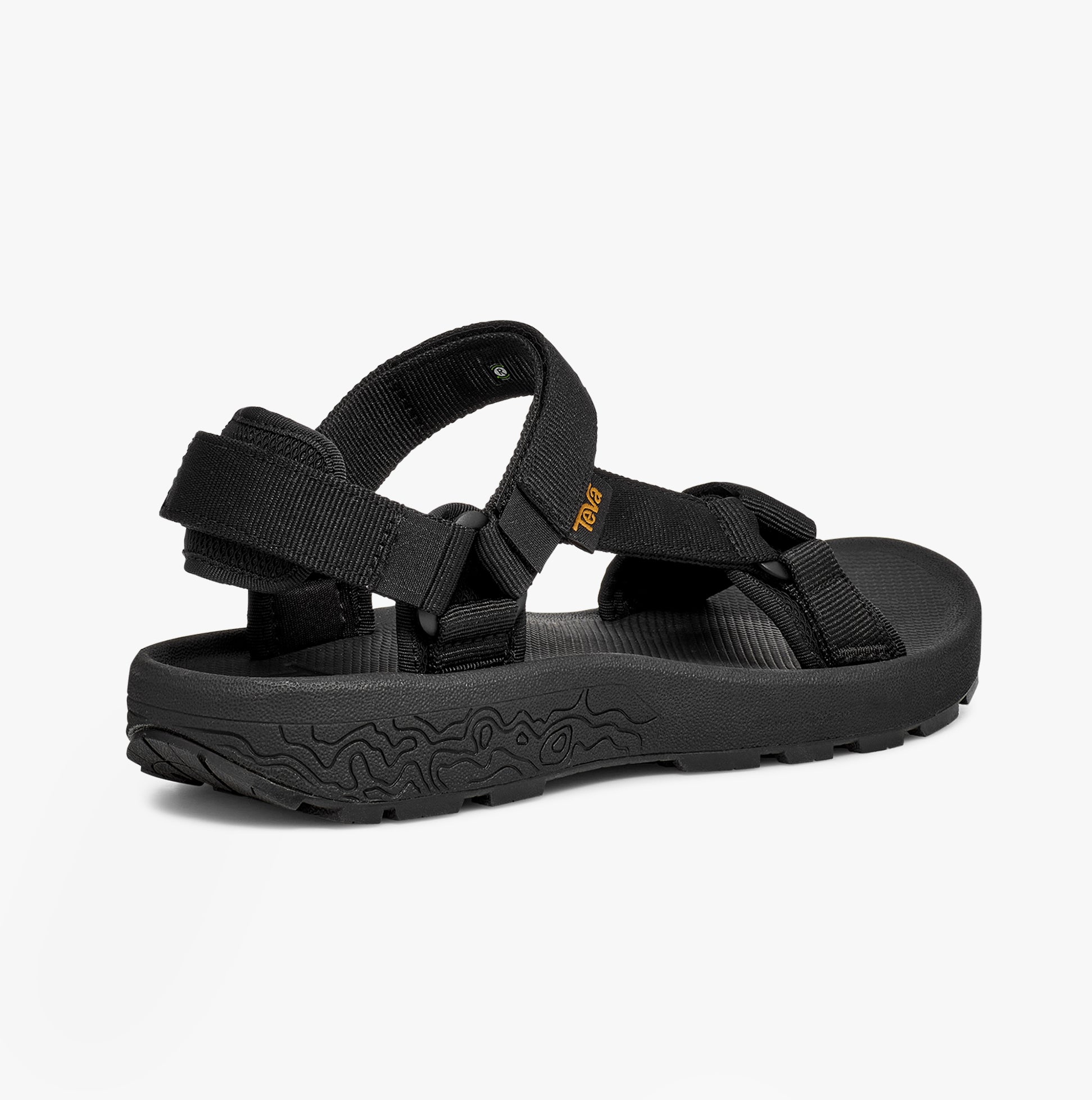 Teva HYDRATREK SANDAL Womens Sandals Black side view, showcasing the textile upper and rubber sole.