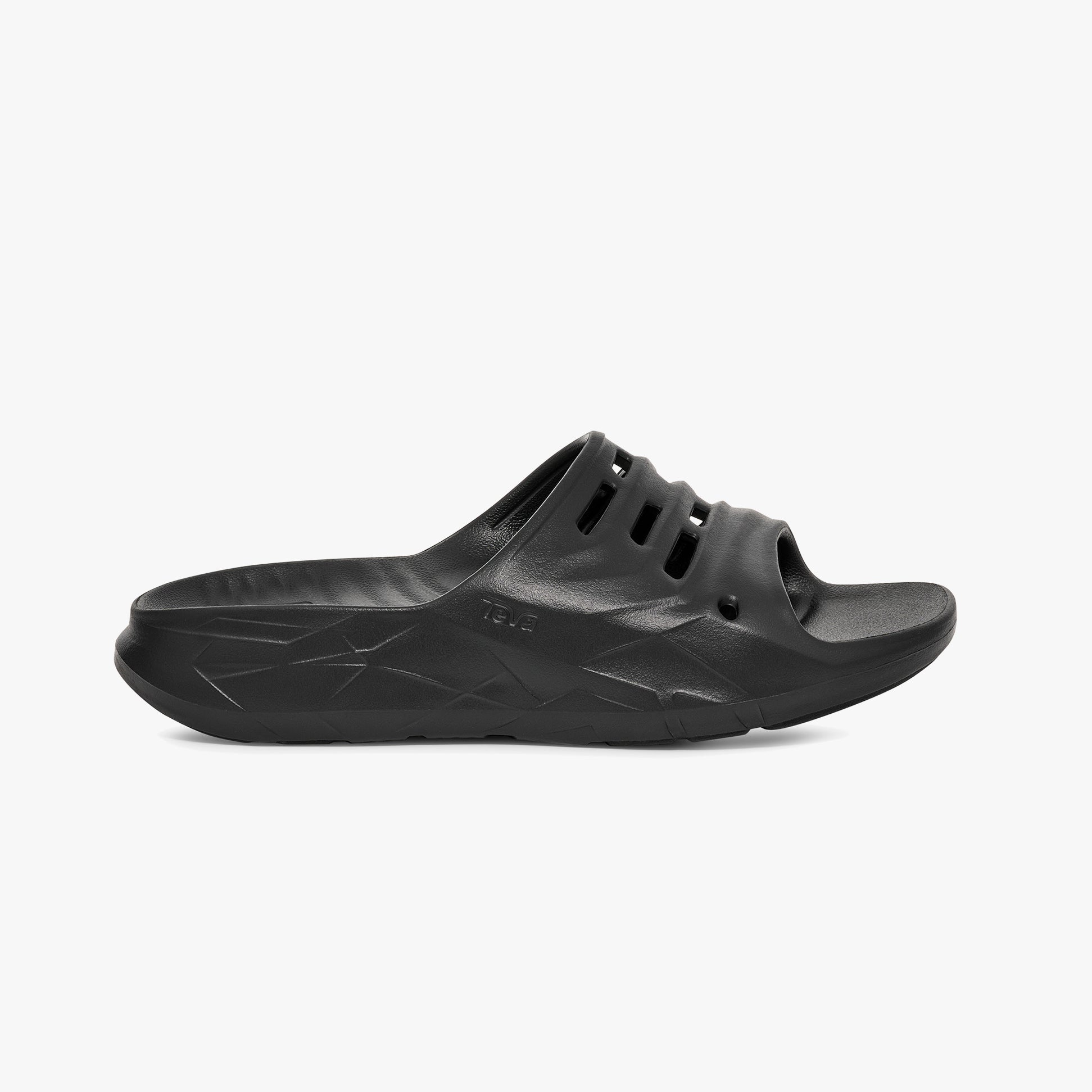 Teva Womens APRE TRAIL Sliders Black side view featuring lightweight EVA material and relaxed slip-on design.