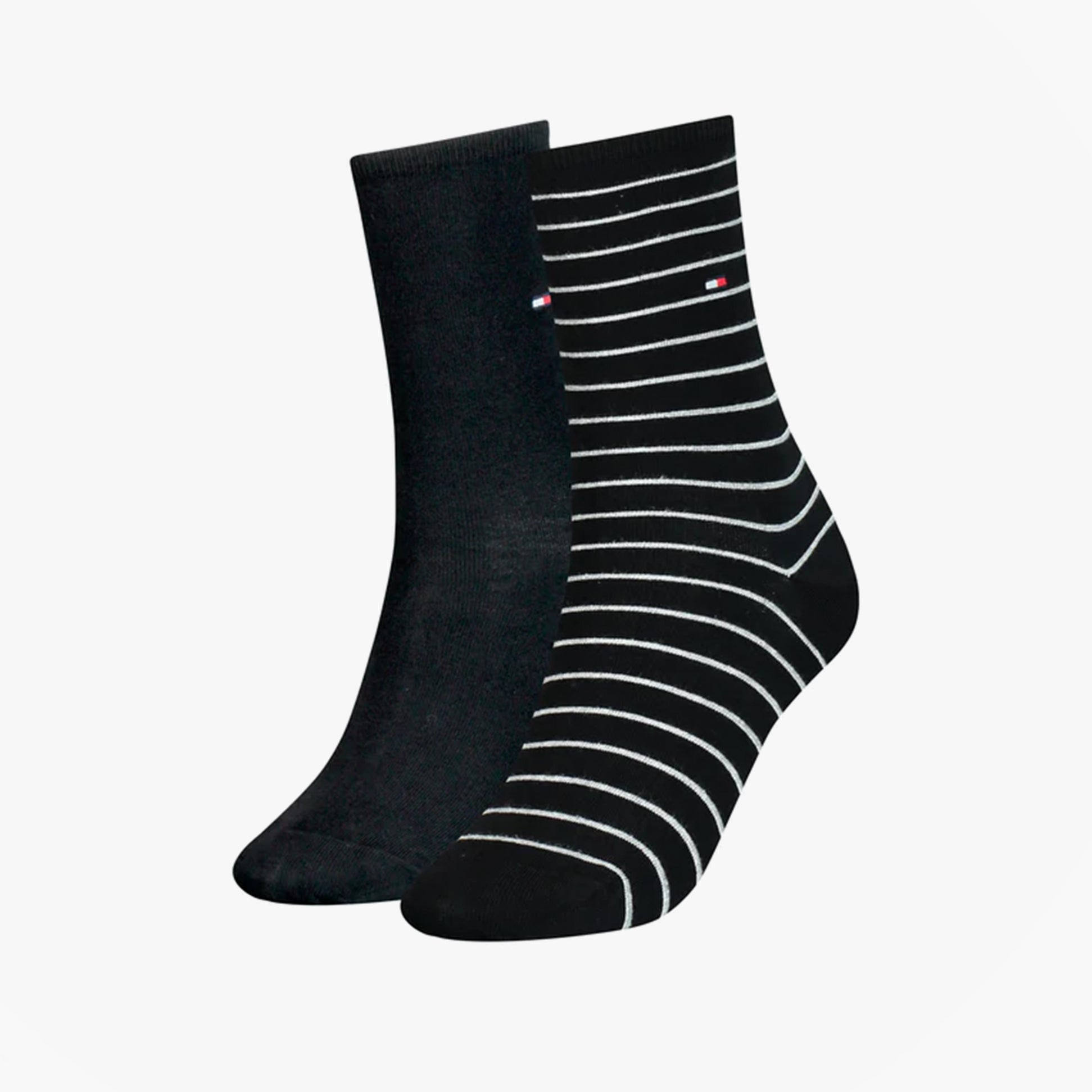 Tommy Hilfiger 2 Pack Womens Crew Stripe Socks Black side view showing solid black and striped designs.