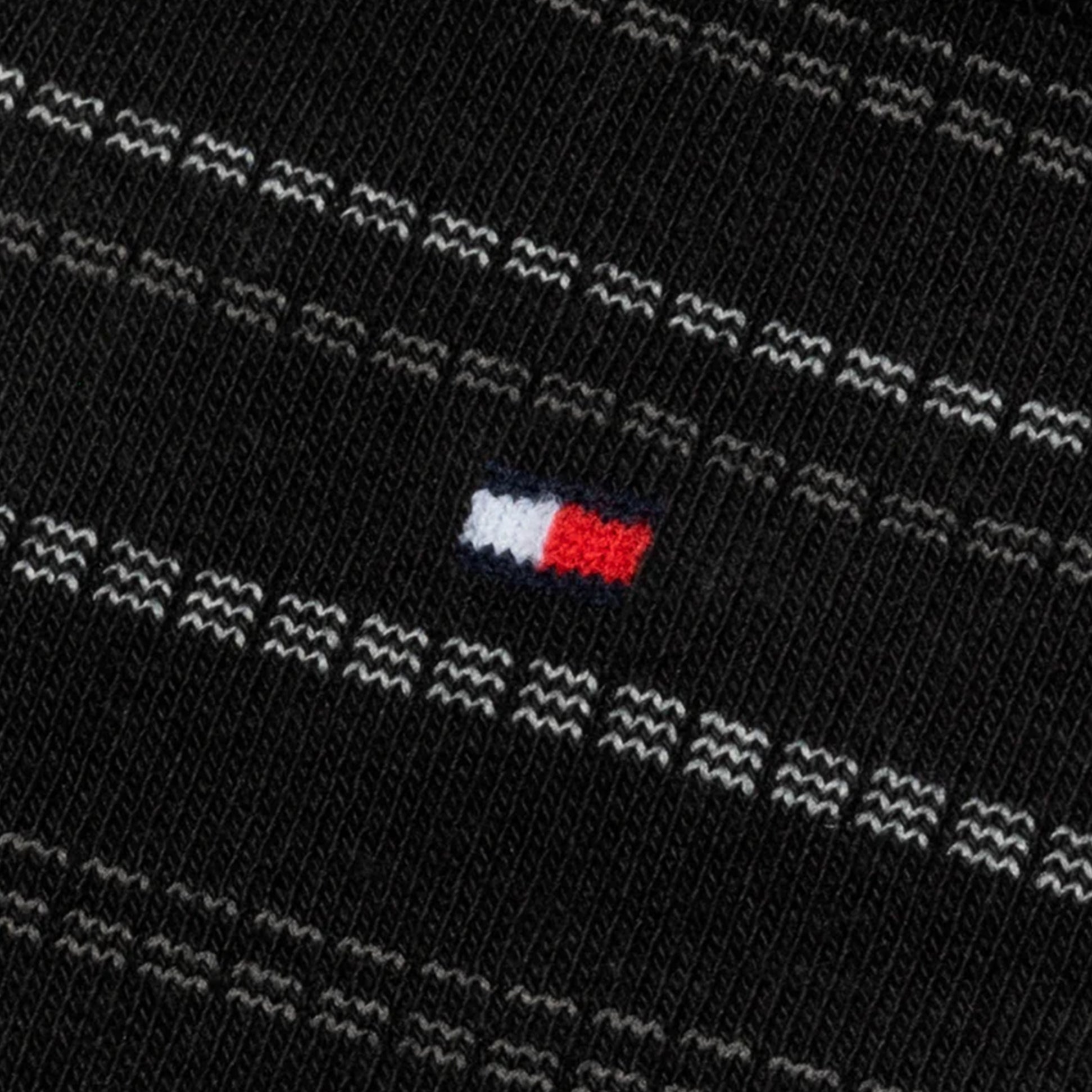 Tommy Hilfiger 4 Pack Giftboxed Classic Mens Crew Socks Black detail view showing logo and design pattern.