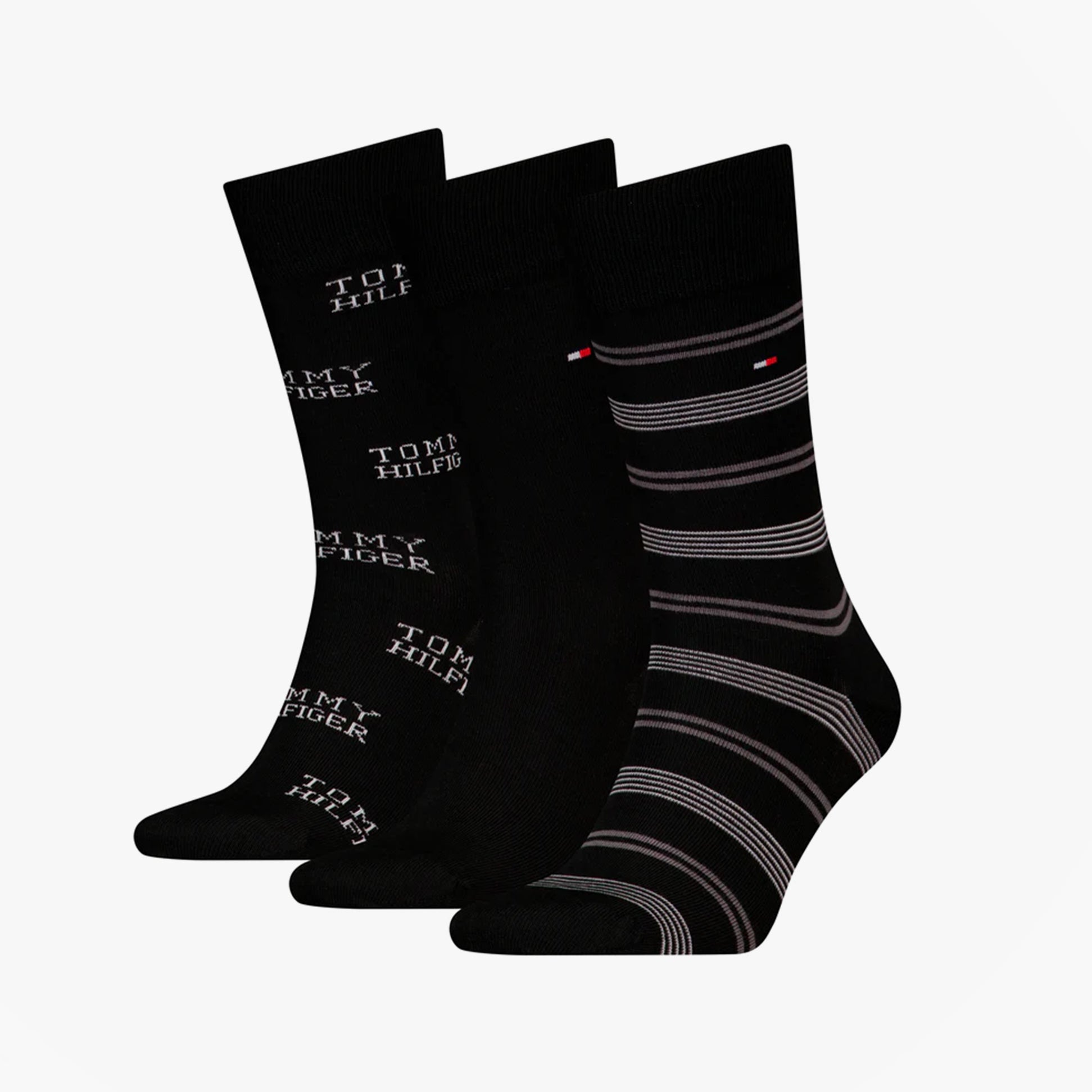 Tommy Hilfiger 3 Pack Giftboxed Classic Mens Crew Socks Black, showing three styles including logo and striped designs.