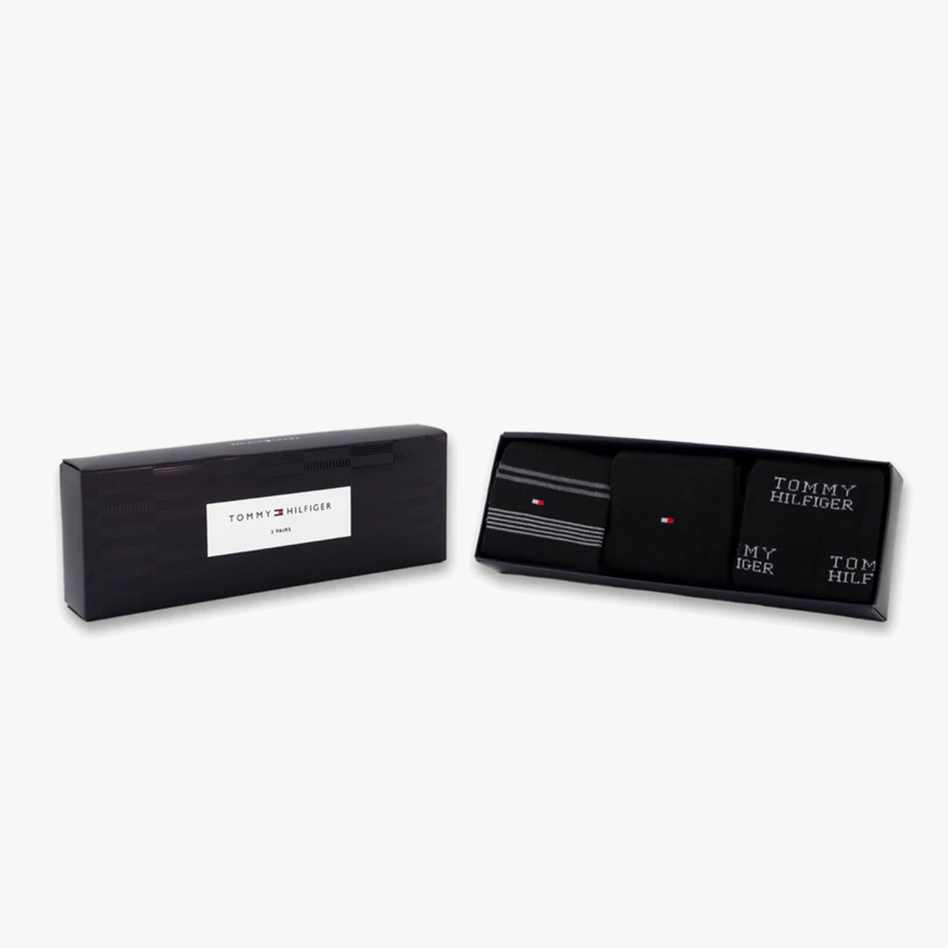 Tommy Hilfiger 3 Pack Giftboxed Classic Mens Crew Socks Black in a gift box, showcasing black and striped designs.