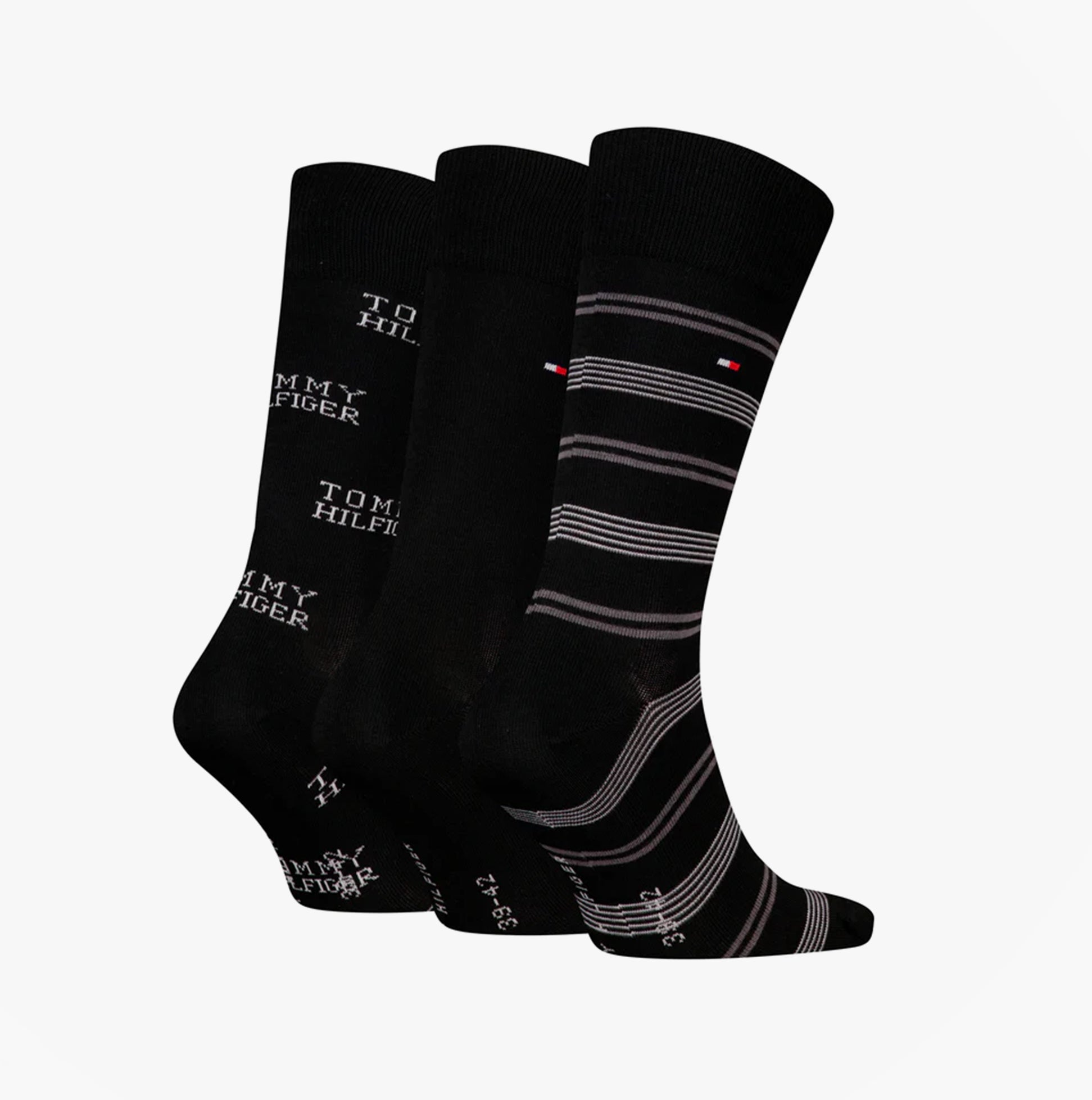 Tommy Hilfiger 3 Pack Giftboxed Classic Mens Crew Socks Black side view showcasing different designs and patterns.