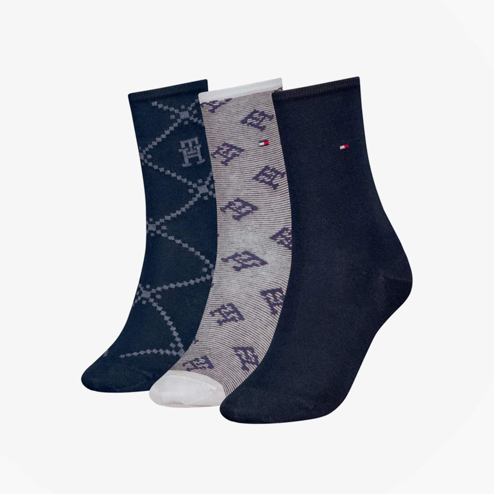 Tommy Hilfiger 3 Pack Giftboxed Monogram Womens Crew Socks Navy side view showcasing navy and patterned designs.